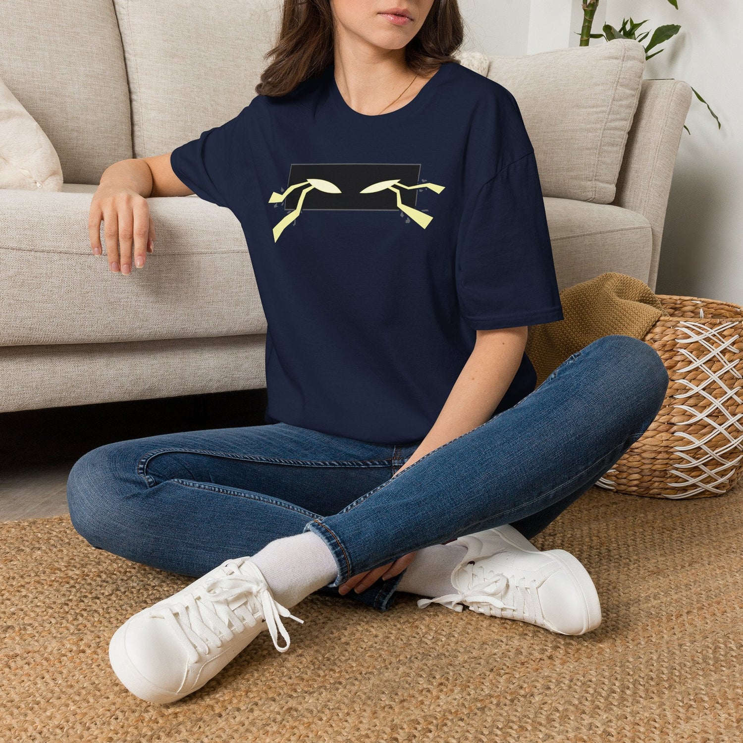 Minimalist Eyes Graphic T-Shirt in Military Green, close-up of chest graphic